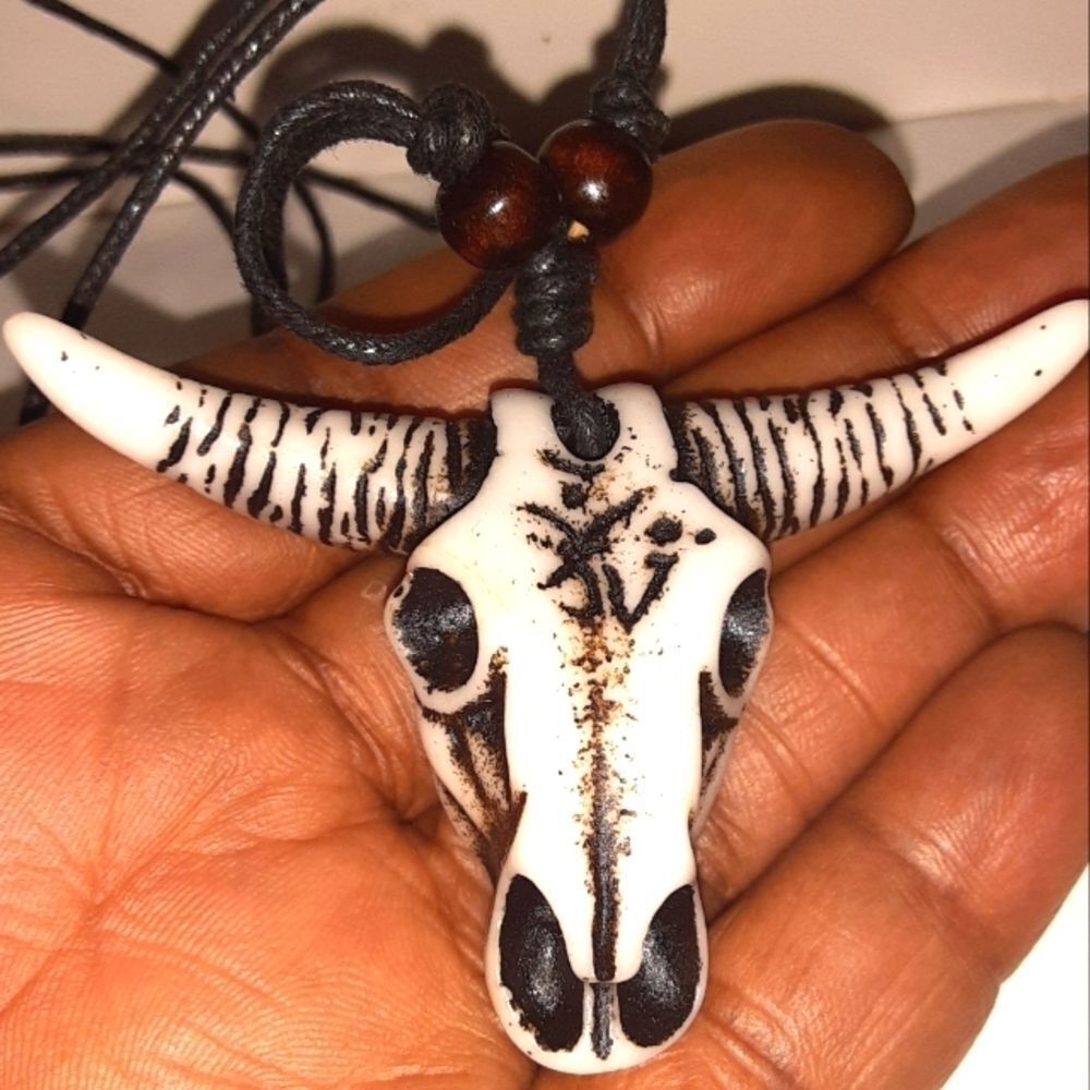 Hand CRAFTED UNISEX black and white bull head pendant with adjustable necklace